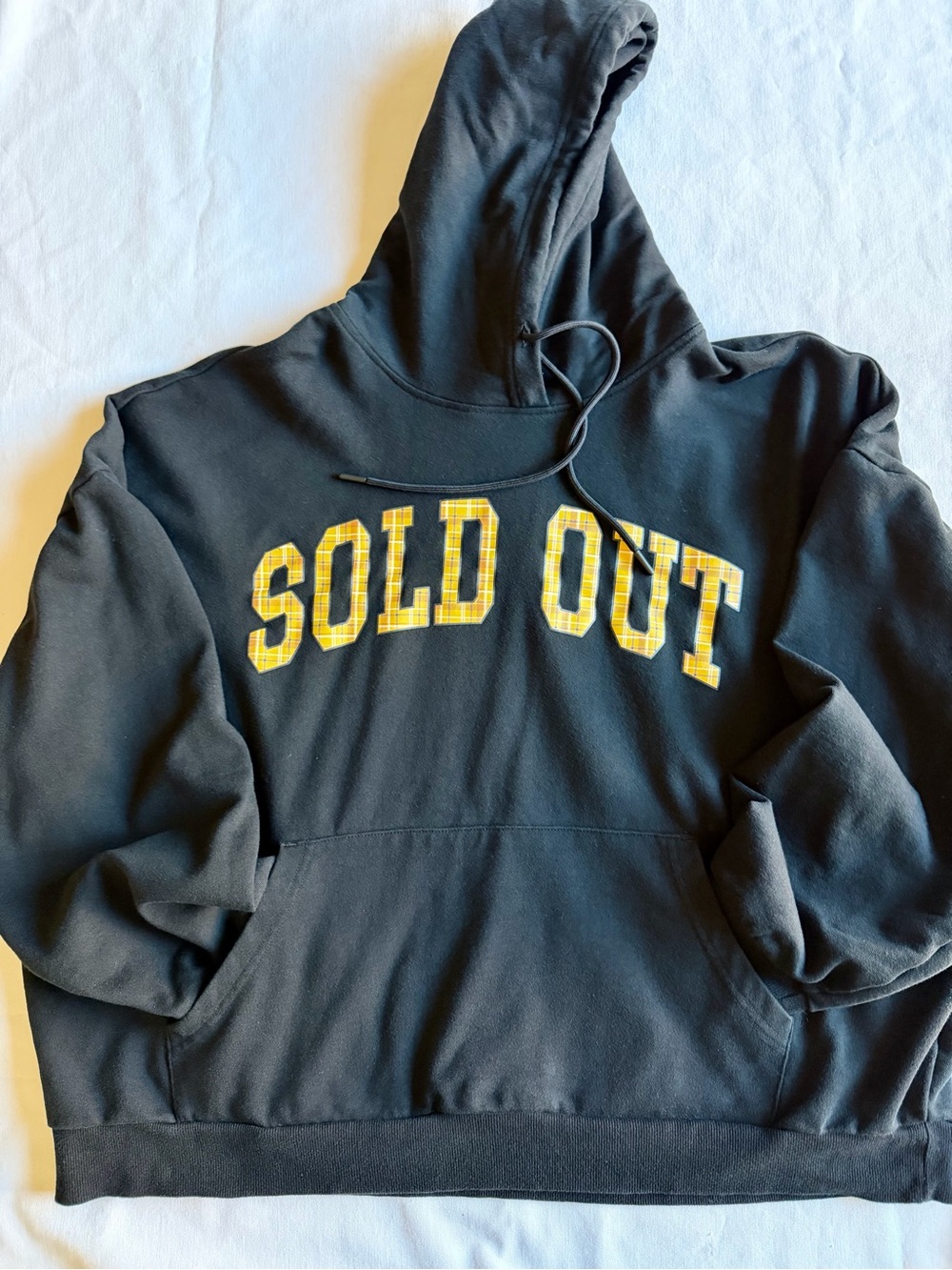 Black Hoodie with Yellow 'SOLD OUT' Plaid Appliqué